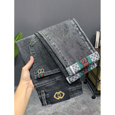 春秋牛仔裤男修身韩版印花青年裤子黑色弹力中腰透气男式长裤