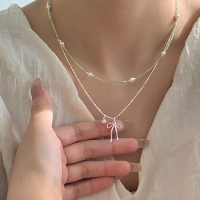 s925纯银天然橄榄石蝴蝶结项链时尚叠戴小众设计毛衣链颈链女送女朋友老婆情人节七夕生日礼物