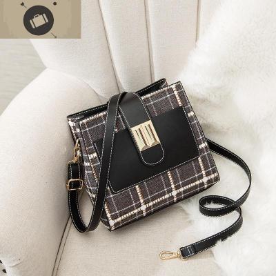 香港时尚百搭真皮包包女包2020新款格子高级感水桶包大容量斜挎包艾狄伊娃女斜挎包