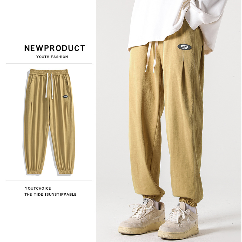 男士休闲裤春季潮牌砂洗起泡弹力斜面料束脚裤纯色宽松运动裤