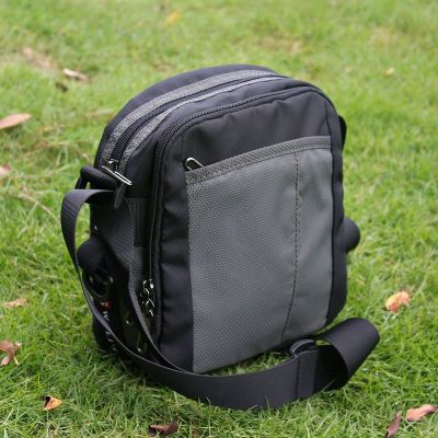 新款男士单肩包斜挎包简约帆布休闲上班户外运动小斜跨包手机男包