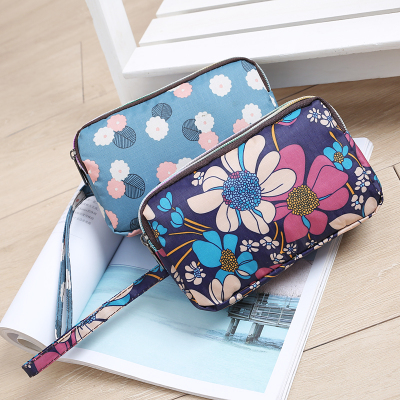 派尼美特防水三层拉链女包布手拿包可以放下手提6寸以下花纹手机包零钱包