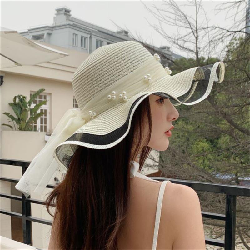 夏季新款帽子女丝带蝴蝶结大檐草帽户外旅游防晒遮阳帽沙滩太阳帽