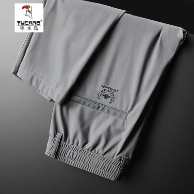 啄木鸟冰丝速干薄款弹力拉链口袋夏季休闲裤直筒耐磨男士冰感长裤
