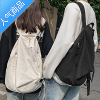 封后书包女大学生韩版不规则设计感森系ins风帆布大容量百搭双肩包男学生书包