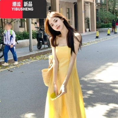 YIBUSHENG茶歇法式黄色吊带连衣裙女季温柔风海边度假收腰显瘦沙滩长裙子