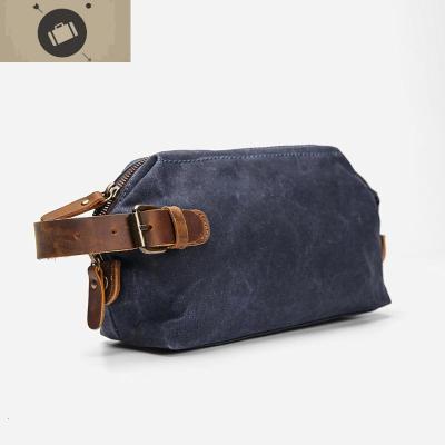 原创手拿包男包帆布手机包男士复古手拎小包防水手抓包艾狄伊娃