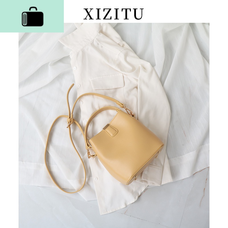 奶色水桶包 夏天包包女2020新款韩版简约百搭单肩斜挎手提小包new