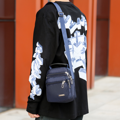 派尼美特单肩包男士休闲斜挎包潮流包包多功能牛津布竖款大容量小背包手提
