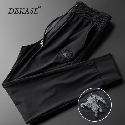 杜卡西品牌运动裤男薄款冰感弹力束脚裤男3D凸胶战马图案修身休闲裤夏季新款