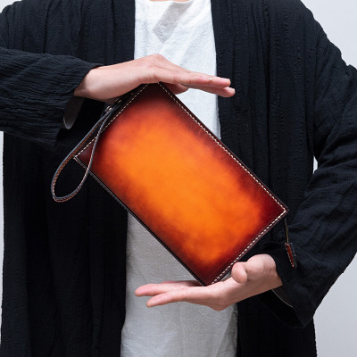 赫泽琼斯HEZZJONS小手包进口意大利牛皮手机包青年商务休闲真皮手腕包情侣手拿包生日礼物定制包包