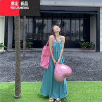 YIBUSHENG白色度假风露背挂脖吊带连衣裙女季高级感气质海边沙滩仙女长裙