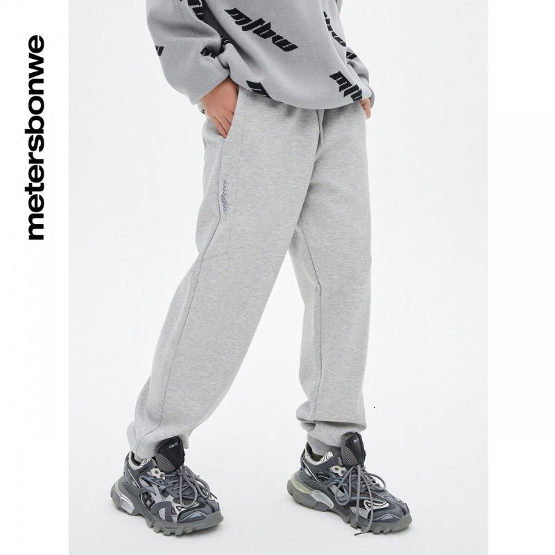 [1件5折价:129.5]美特斯邦威男满印收脚口针织长裤